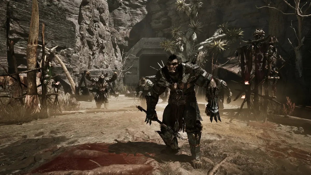 Armored orcs gather in front of a stone entrance in an official Gothic 1 Remake screenshot.